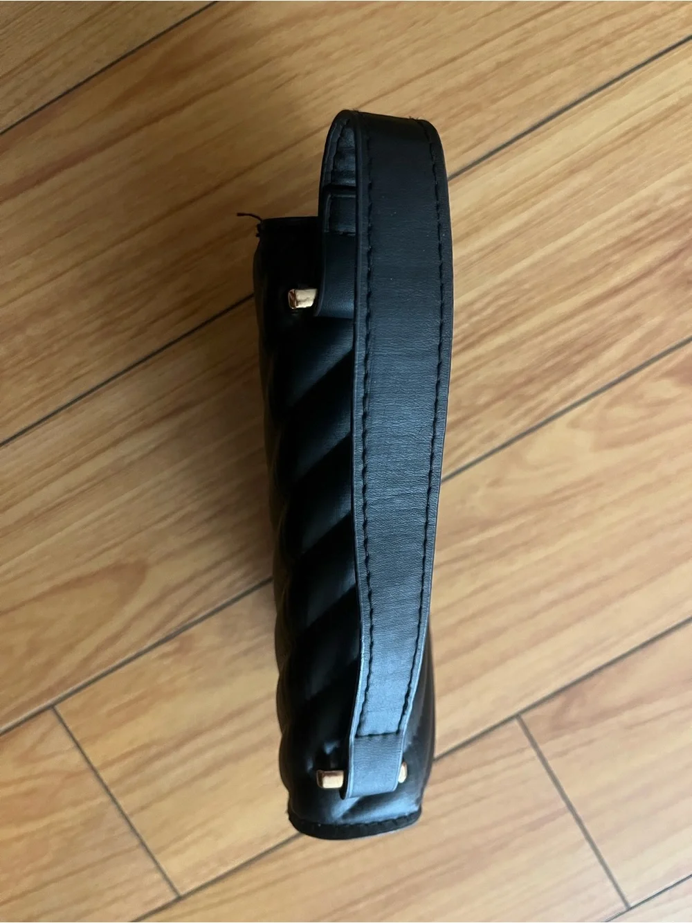 Black Quilted Shoulder Bag with Gold Heart Accent